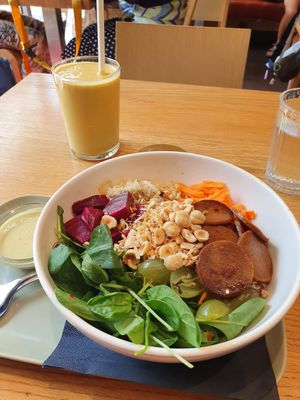 Salad with buckwheat and yellow smoothie at Veganika in Ljubljana
