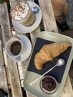 Croissant with raspberry jam, Americano, Iced Coffee  at Veganika in Ljubljana