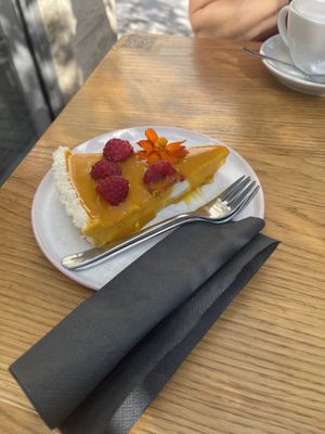 Raw Mango cake 😋  at Veganika in Ljubljana