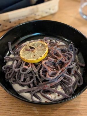 Blueberry noodles with lemon pepper sauce at Veganika in Ljubljana