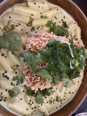 Fried tofu with rice cakes in green curry sauce  at Veganika in Ljubljana