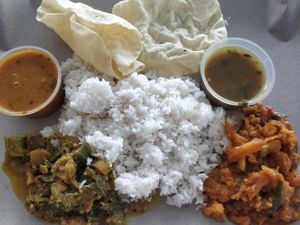 Set rice with papadum, cauliflower, lady finger, egg plant at Angu Vilas in West Singapore