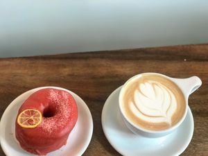 Super delicious strawberry lemonade doughnut and Pumpkin +Spice latte with oat milk  at The Salty Donut in Miami