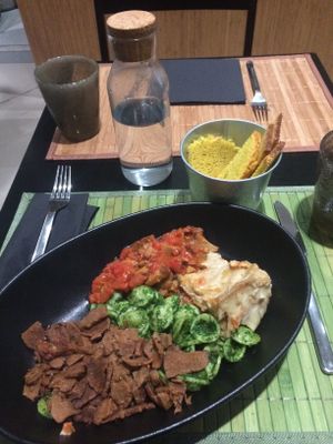 corn bread, lasagna, spicy pesto pasta, seitan and veggies and tofu stripes at Demetra in Milan