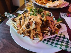 Smash burger poutine 🤤 tasty  #Veganuary at Leopold's Tavern in Calgary