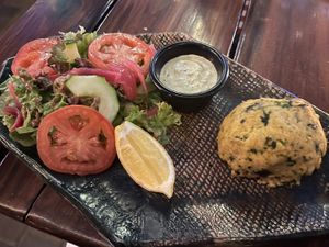 Appetizer size- vegan crab cake with salad and tartare sauce  at Papillon in Palm Beach