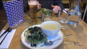 Pesto sandwich and soup and seitan burger in the background  at Stereo in Glasgow