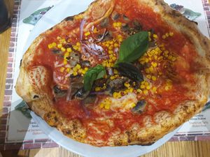 Vegan pizza with basil, onion, mushrooms and spicy corn at Frankie's in Sorrento
