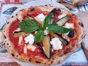 Sicily pizza with aubergine and vegan cheese at Frankie's in Sorrento
