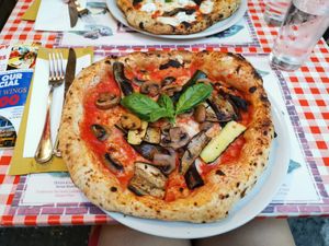 Pizza with vegan cheese, courgette, aubergine and mushrooms at Frankie's in Sorrento