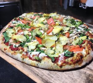 LAURI'S FAVORITE
Spinach, broccoli, mushroom, artichoke, tomato, on spinach crust at Sibie's Pizza in Amherst