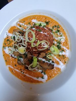 Hunter's sauce with scoops of spicy buckwheat, grilled mushrooms at Flow Specialty Coffee Bar & Bistro in Budapest