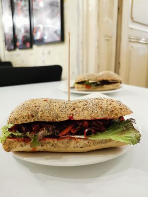 Beetroot and hummus sandwich with fresh salad at Flow Specialty Coffee Bar & Bistro in Budapest