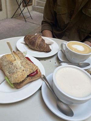 Roasted red pepper & quinoa paté sandwich, whole meal croissant (very soft), pea chai latte & an oat agave latte  at Flow Specialty Coffee Bar & Bistro in Budapest
