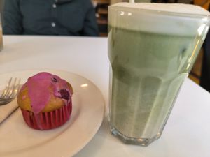 Raspberry muffin and iced matcha latte at Flow Specialty Coffee Bar & Bistro in Budapest