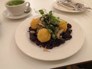 Vegan millet and cheese balls with red cabbage and swiss chard at Flow Specialty Coffee Bar & Bistro in Budapest