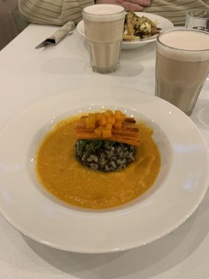 beluga lentils & chai w/ oat milk at Flow Specialty Coffee Bar & Bistro in Budapest