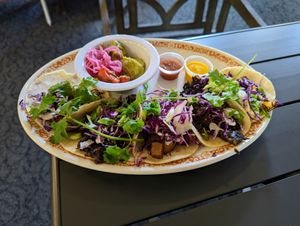 Tacos al pastor and aubergine. at One Grub Community in El Paso