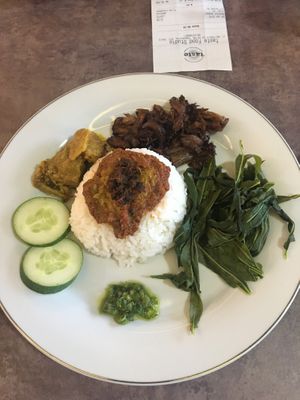 Paket 1 (rice, jackfruit, mushrooms, veg, sambal and cucumber) at Padang Vegan Damai in Yogyakarta