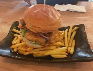 Vegan Chickaan Burger: Crispy mock chicken with our homemade warm peanut butter sauce and holy basil guac. at Viet Shack in Manchester
