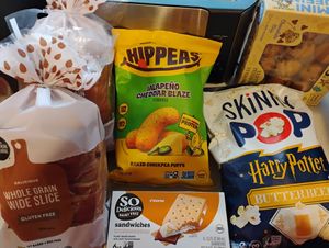 Some vegan items on 3/15/26 (Limited Edition butterbeer popcorn, gluten-free bread, and other snacks) at Sprouts Farmers Market in Naples