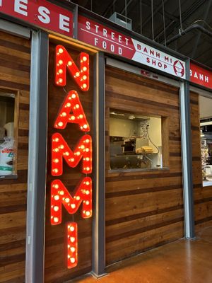 Window to the kitchen. Say hi to the sweet woman doing the cooking!  at Dallas Farmers Market in Dallas