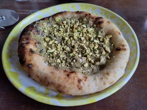 Sweet dessert - pistachio cream pizza 😋 at Plant Club in North London