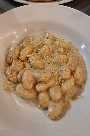 Gnocchi with pepper sauce, parmesan and truffle oil at Plant Club in North London