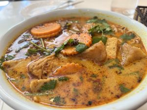 Noodles in a coconut broth - super delicious   at Golden Lotus Vegan Restaurant in Oakland