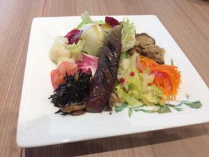 Beautiful and delightful salad with many flavors. The smoked eggplant in the center was excellent. at M's Table in Yokohama