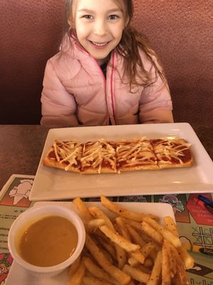 Kids vegan flat bread pizza with crack pepper fries and cheeze sauce to dip. I had a very happy vegan girl.  at Blondie's in Flint
