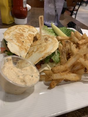 Vegan quesadilla burger with fries at Blondie's in Flint