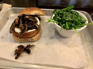 Beyond Burger with Daiya Swiss and truffle mushrooms with a side of garlic spinach.  at Brooklyn Burgers & Beer in Brooklyn