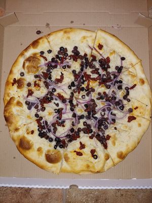 20" Olympus Pizza with Vegan Cheese: $28.25 at The Pizza Joint - Westwind Dr in El Paso