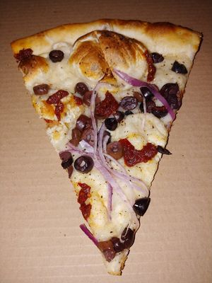 Olympus Pizza with Vegan Cheese Slice at The Pizza Joint - Westwind Dr in El Paso
