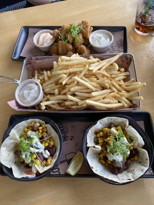 From top: fried cauliflower (really yum), shoestring fries with vegan aioli, veganised corn tacos   at Monteiths in Greymouth