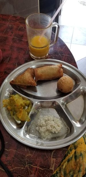 Samosa spring roll and kachori (I think) with cooked veg and coconut chutney at Abbasi Cold Drink House in Dar Es Salaam