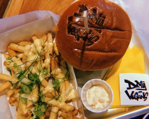 Dirty bbq butter upgraded to the beyond party, garlic fries and side of mayo. Love the bun stamp. at Kibae (Formerly Plant Hustler) in Poole