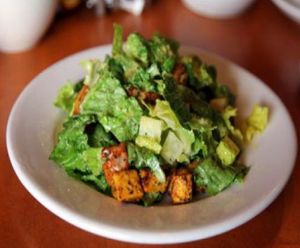 Caesar salad with vegan croutons at Hugo's - West Hollywood in West Hollywood