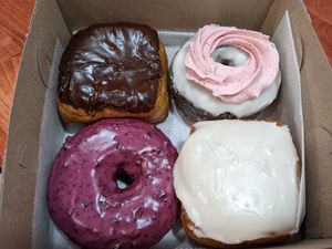 Boston cream, Neapolitan, blueberry, maple cream at The Vegan Doughnut Company in Lakewood