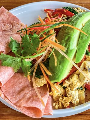 Vegan Tofu Scramble served on a SIDE PLATE—please report that even so, the top portion of the plate is empty.   at Kayu Lembongan in Lembongan