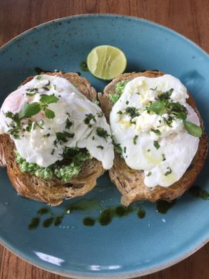 Happea Dayz- Smashed peas with feta, mint topped with free range organic eggs.   at Kayu Lembongan in Lembongan