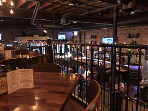 Balcony seating at The Little Owl Social Pub in Brookfield