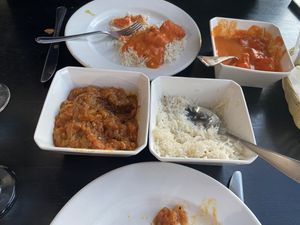 ignore the chicken masala on top that my hubs was eating. focus on the eggplant dish at the bottom of the pic 😋  at Indigo Indian Bistro in Shreveport