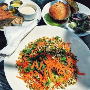 Raw salad - huge portion and nice crusty bread. Falafel burger is pretty good too. at Artjuna in Anjuna