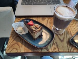Vegan Chocolate and peanut cake + hot chocolate with oat milk at VegB12 in Tallinn