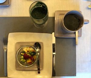 Kick starting my day with fruit salad, green juice with spirulina and decaf coffee :) at Lut's B&B in South Hykeham