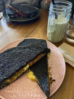 vegan cheese pesto and tomato toastie with iced matcha latte  at Plantarium Cafe in Stratford-upon-avon