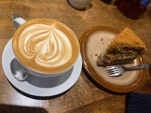 Biscoff cake & oat latte  at Plantarium Cafe in Stratford-upon-avon