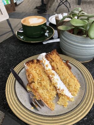 Lemon drizzle cake and oat milk latte 💗✨ at Plantarium Cafe in Stratford-upon-avon
